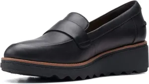 Clarks womens Sharon Gracie Penny Loafer, Black Leather With Dark Tan Welt, 8 US